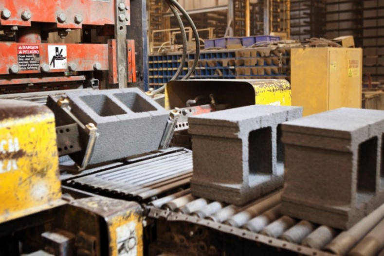 Block being made on a conveyer belt.